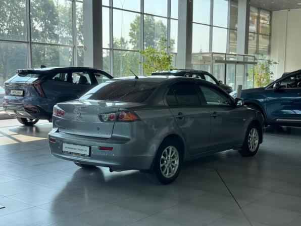 Mitsubishi Lancer X Рестайлинг с пробегом 2013 года, цена 945 000 рублей, 210000 км, седан, Автокод Объявления