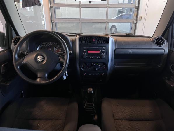 Suzuki Jimny III Рестайлинг 2 с пробегом 2013 года, цена 1 394 000 рублей, 106457 км, внедорожник, Автокод Объявления
