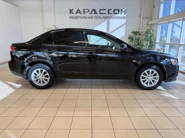 Mitsubishi Lancer X Рестайлинг с пробегом 2011 года, цена 650 000 рублей, 208000 км, седан, Автокод Объявления