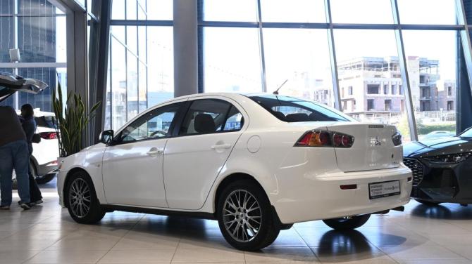 Mitsubishi Lancer X Рестайлинг с пробегом 2013 года, цена 679 000 рублей, 205355 км, седан, Автокод Объявления