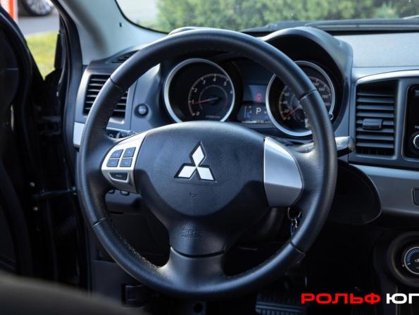 Mitsubishi Lancer X Рестайлинг с пробегом 2014 года, цена 1 078 000 рублей, 100700 км, седан, Автокод Объявления