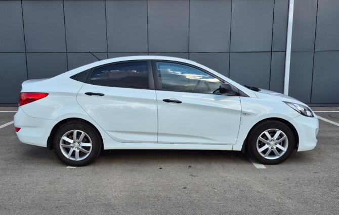 Hyundai Solaris I с пробегом 2013 года, цена 840 000 рублей, 169200 км, седан, Автокод Объявления