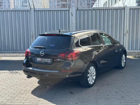 Opel Astra J с пробегом 2012 года, цена 675 000 рублей, 202351 км, универсал, Автокод Объявления