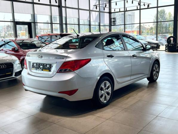 Hyundai Solaris I Рестайлинг с пробегом 2014 года, цена 750 000 рублей, 214000 км, седан, Автокод Объявления