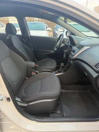 Hyundai Solaris I Рестайлинг с пробегом 2014 года, цена 1 079 000 рублей, 56983 км, седан, Автокод Объявления