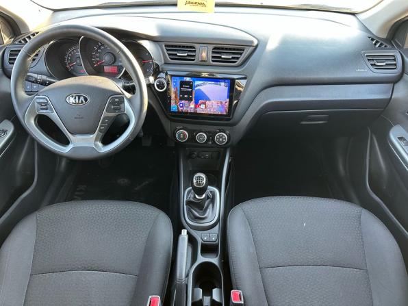Kia Rio III Рестайлинг с пробегом 2015 года, цена 1 049 000 рублей, 141251 км, седан, Автокод Объявления