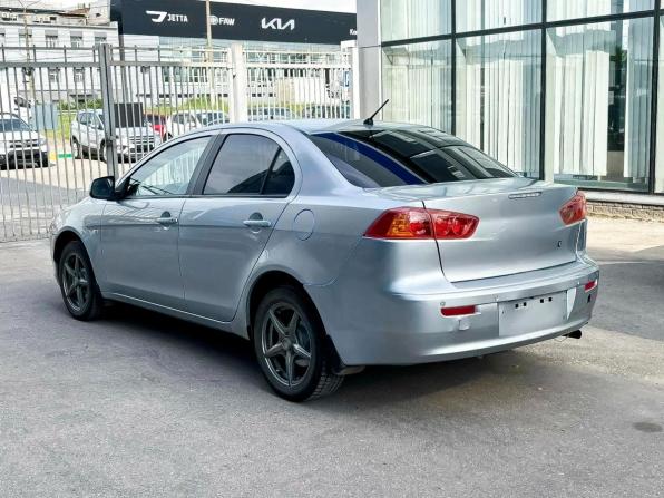 Mitsubishi Lancer X с пробегом 2009 года, цена 409 000 рублей, 341027 км, седан, Автокод Объявления