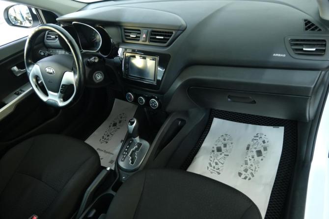 Kia Rio III Рестайлинг с пробегом 2015 года, цена 1 169 000 рублей, 120700 км, хэтчбек, Автокод Объявления