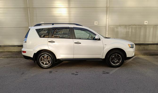 Mitsubishi Outlander II Рестайлинг с пробегом 2011 года, цена 849 000 рублей, 292645 км, внедорожник, Автокод Объявления