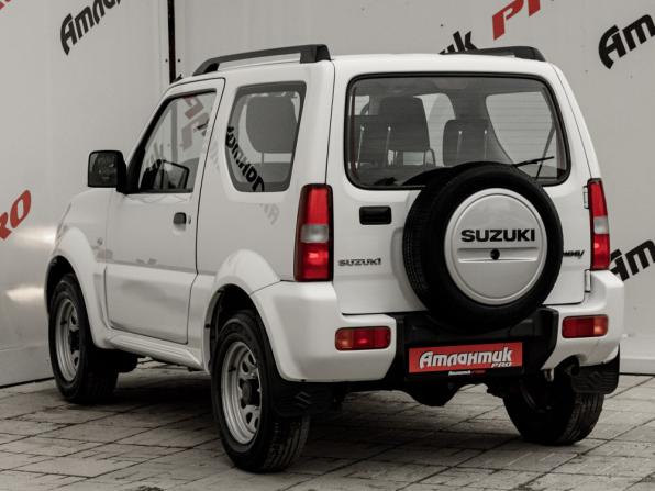 Suzuki Jimny III Рестайлинг 2 с пробегом 2013 года, цена 1 500 000 рублей, 52577 км, внедорожник, Автокод Объявления