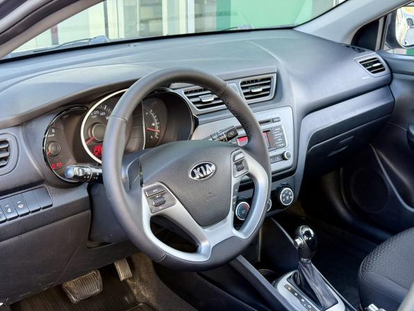 Kia Rio III Рестайлинг с пробегом 2015 года, цена 1 070 000 рублей, 100523 км, седан, Автокод Объявления