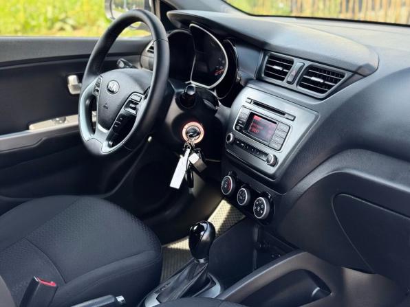 Kia Rio III Рестайлинг с пробегом 2015 года, цена 1 159 000 рублей, 91254 км, хэтчбек, Автокод Объявления