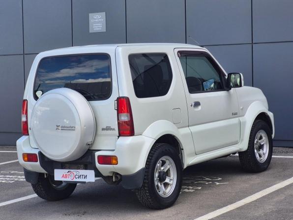 Suzuki Jimny III Рестайлинг 2 с пробегом 2014 года, цена 1 430 000 рублей, 113983 км, внедорожник, Автокод Объявления