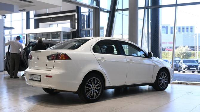Mitsubishi Lancer X Рестайлинг с пробегом 2013 года, цена 679 000 рублей, 205355 км, седан, Автокод Объявления