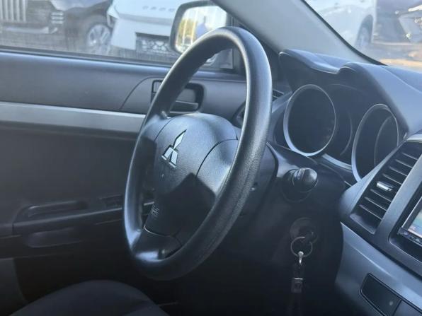 Mitsubishi Lancer X с пробегом 2009 года, цена 650 000 рублей, 245305 км, седан, Автокод Объявления