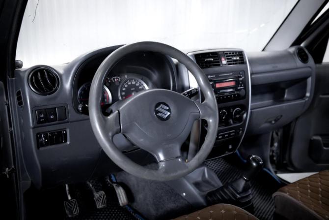Suzuki Jimny III Рестайлинг 1 с пробегом 2011 года, цена 1 170 000 рублей, 199661 км, внедорожник, Автокод Объявления