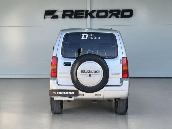 Suzuki Jimny III Рестайлинг 2 с пробегом 2012 года, цена 1 089 000 рублей, 122818 км, внедорожник, Автокод Объявления