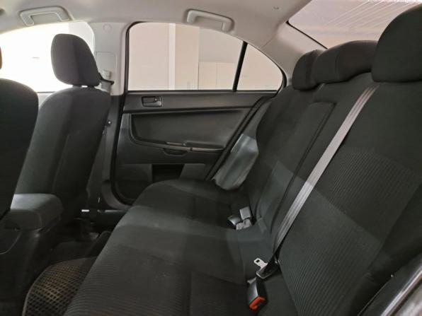Mitsubishi Lancer X Рестайлинг с пробегом 2013 года, цена 840 000 рублей, 215408 км, седан, Автокод Объявления