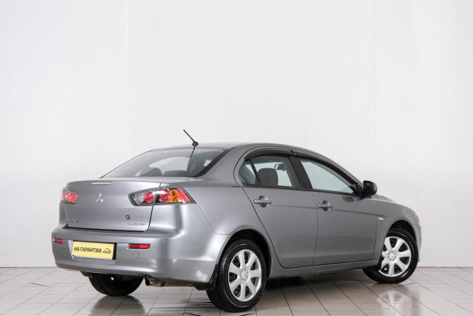 Mitsubishi Lancer X Рестайлинг с пробегом 2013 года, цена 889 000 рублей, 285000 км, седан, Автокод Объявления