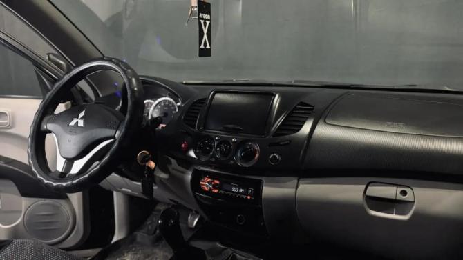 Mitsubishi L200 IV с пробегом 2012 года, цена 1 250 000 рублей, 302538 км, пикап, Автокод Объявления