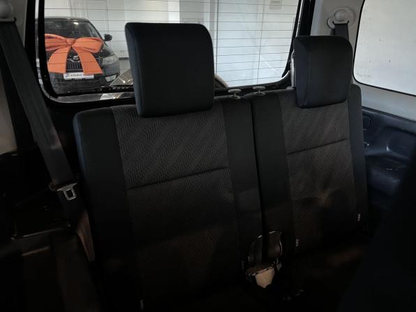 Suzuki Jimny III Рестайлинг 2 с пробегом 2013 года, цена 1 394 000 рублей, 106457 км, внедорожник, Автокод Объявления