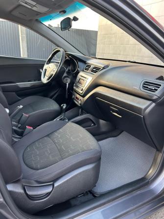 Kia Rio III Рестайлинг с пробегом 2015 года, цена 1 060 000 рублей, 137300 км, седан, Автокод Объявления