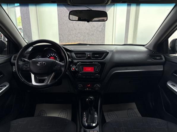 Kia Rio III Рестайлинг с пробегом 2015 года, цена 1 365 000 рублей, 33893 км, хэтчбек, Автокод Объявления