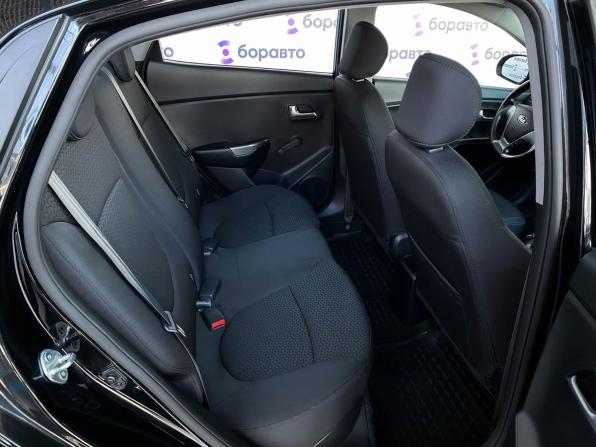 Kia Rio III Рестайлинг с пробегом 2015 года, цена 990 000 рублей, 112761 км, седан, Автокод Объявления
