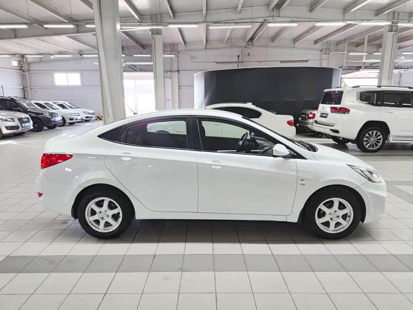 Hyundai Solaris I Рестайлинг с пробегом 2014 года, цена 635 000 рублей, 179500 км, седан, Автокод Объявления