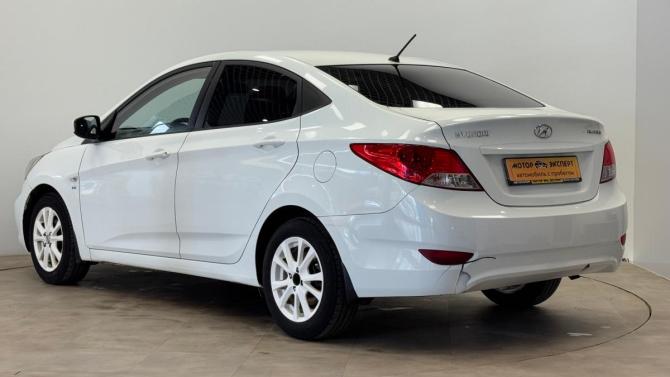 Hyundai Solaris I Рестайлинг с пробегом 2014 года, цена 650 000 рублей, 183065 км, седан, Автокод Объявления