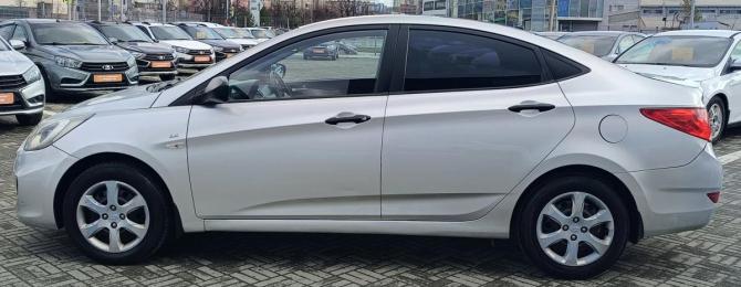 Hyundai Solaris I с пробегом 2014 года, цена 670 000 рублей, 211000 км, седан, Автокод Объявления