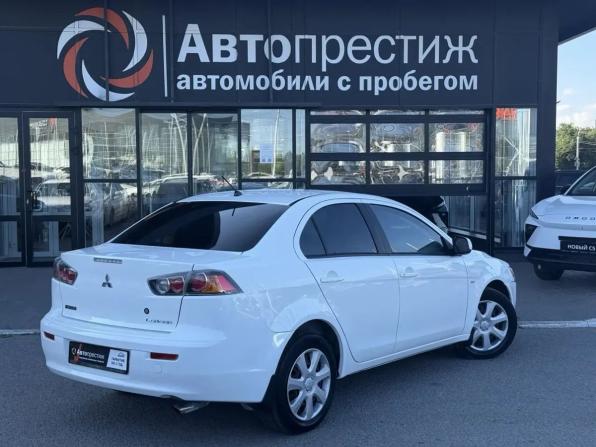 Mitsubishi Lancer X с пробегом 2009 года, цена 650 000 рублей, 245305 км, седан, Автокод Объявления