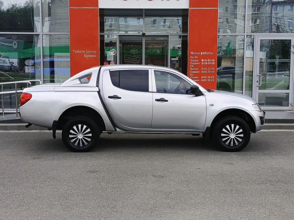 Mitsubishi L200 IV с пробегом 2011 года, цена 889 000 рублей, 325404 км, offers.body_type.unknown, Автокод Объявления