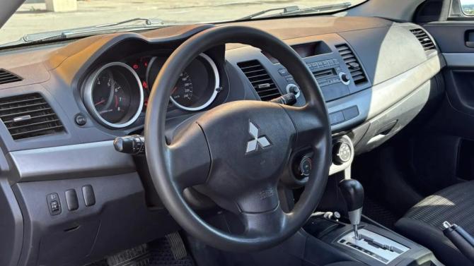 Mitsubishi Lancer X Рестайлинг с пробегом 2012 года, цена 950 000 рублей, 195000 км, седан, Автокод Объявления