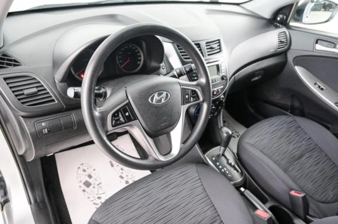 Hyundai Solaris I Рестайлинг с пробегом 2014 года, цена 1 049 000 рублей, 112400 км, седан, Автокод Объявления