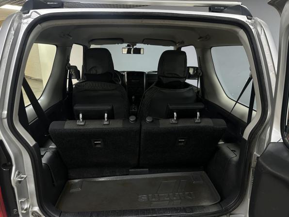 Suzuki Jimny III Рестайлинг 2 с пробегом 2013 года, цена 1 379 000 рублей, 113876 км, внедорожник, Автокод Объявления