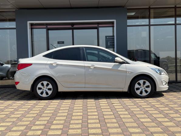 Hyundai Solaris I Рестайлинг с пробегом 2015 года, цена 815 000 рублей, 223000 км, седан, Автокод Объявления