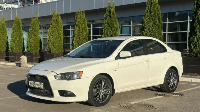 Mitsubishi Lancer X Рестайлинг с пробегом 2013 года, цена 695 000 рублей, 205355 км, седан, Автокод Объявления