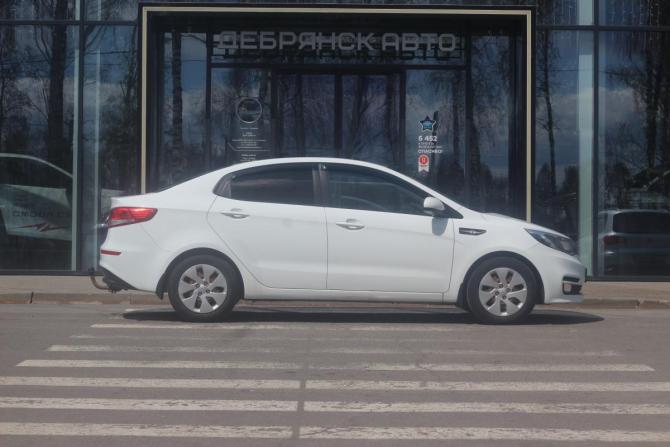 Kia Rio III Рестайлинг с пробегом 2015 года, цена 1 100 000 рублей, 202401 км, седан, Автокод Объявления