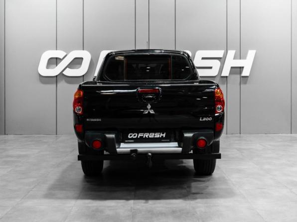 Mitsubishi L200 IV с пробегом 2012 года, цена 1 450 000 рублей, 142583 км, offers.body_type.unknown, Автокод Объявления