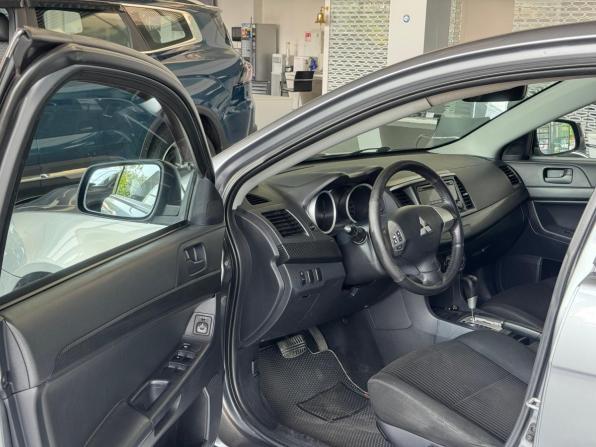 Mitsubishi Lancer X Рестайлинг с пробегом 2013 года, цена 945 000 рублей, 210000 км, седан, Автокод Объявления