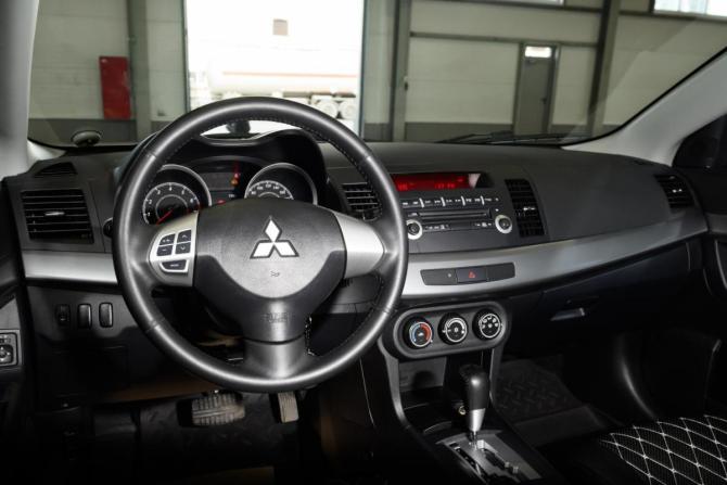 Mitsubishi Lancer X Рестайлинг с пробегом 2011 года, цена 1 339 000 рублей, 50077 км, седан, Автокод Объявления