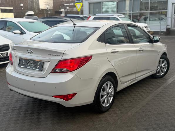 Hyundai Solaris I Рестайлинг с пробегом 2014 года, цена 1 079 000 рублей, 56983 км, седан, Автокод Объявления