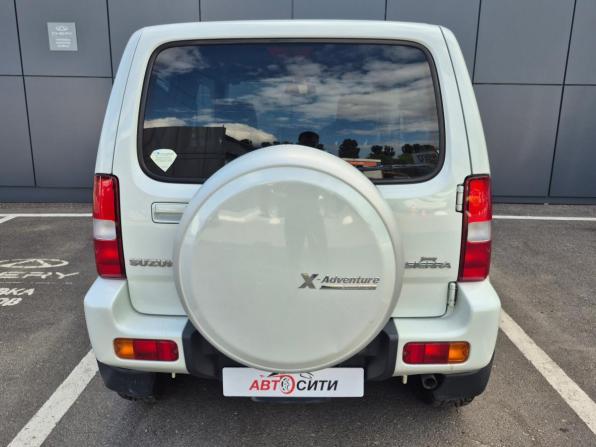Suzuki Jimny III Рестайлинг 2 с пробегом 2014 года, цена 1 430 000 рублей, 113983 км, внедорожник, Автокод Объявления