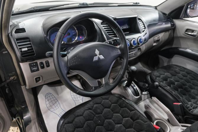 Mitsubishi L200 IV с пробегом 2008 года, цена 1 379 000 рублей, 159000 км, offers.body_type.unknown, Автокод Объявления