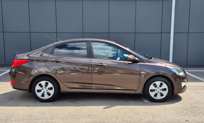 Hyundai Solaris I Рестайлинг с пробегом 2015 года, цена 799 900 рублей, 143000 км, седан, Автокод Объявления