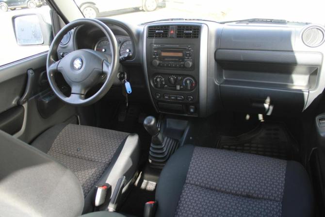 Suzuki Jimny III Рестайлинг 1 с пробегом 2012 года, цена 1 325 000 рублей, 67000 км, внедорожник, Автокод Объявления