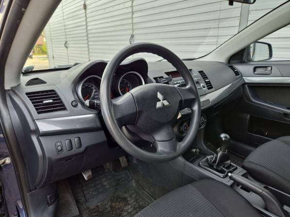 Mitsubishi Lancer X с пробегом 2009 года, цена 650 000 рублей, 185283 км, седан, Автокод Объявления