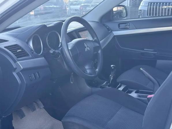 Mitsubishi Lancer X с пробегом 2009 года, цена 650 000 рублей, 245305 км, седан, Автокод Объявления