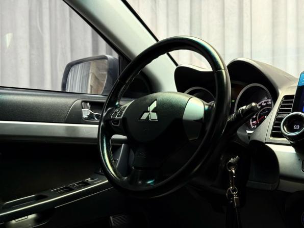 Mitsubishi Lancer X Рестайлинг с пробегом 2011 года, цена 659 000 рублей, 184181 км, седан, Автокод Объявления
